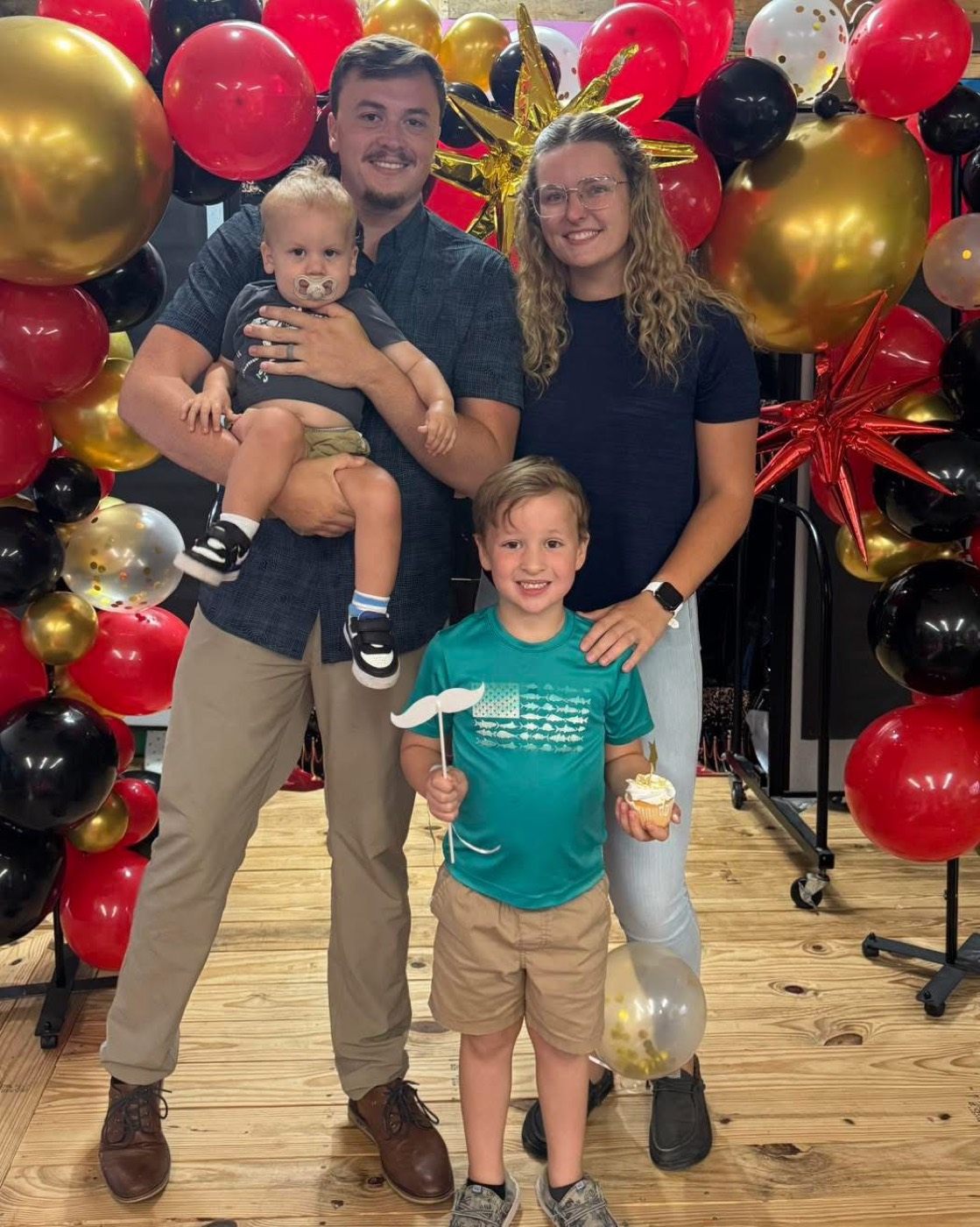 Kyra East with her husband and their two boys
