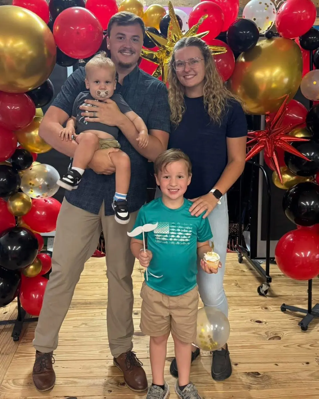 Kyra East with her husband and their two boys
